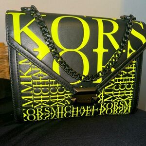 Michael Kors Whitney Large Newsprint Leather Convertible bag